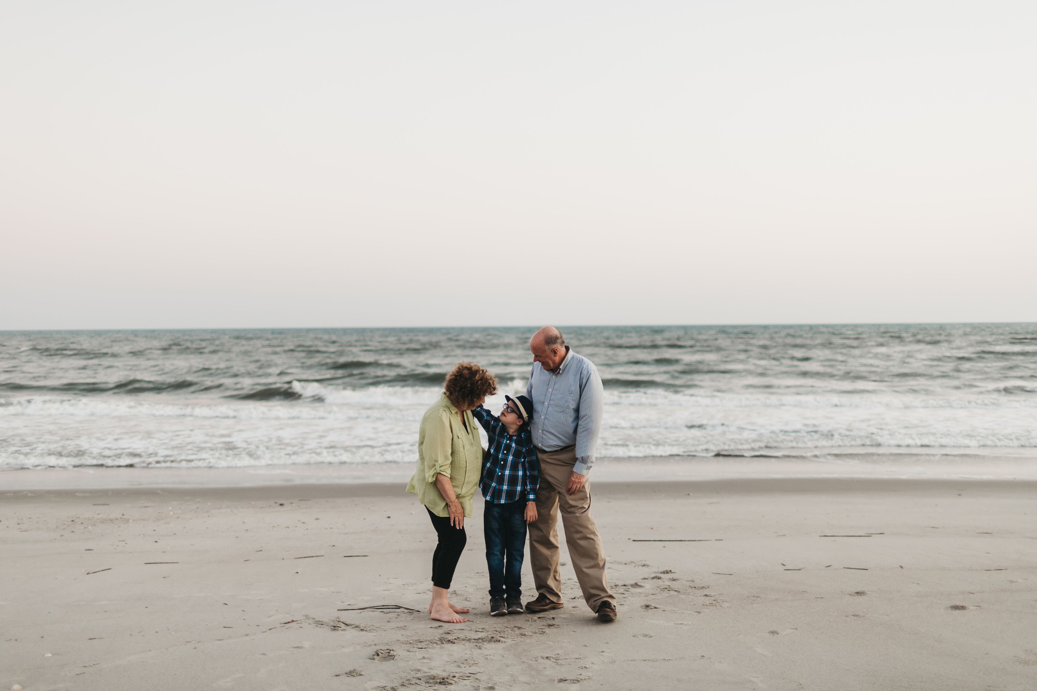 Robert Whitlow with family on beach